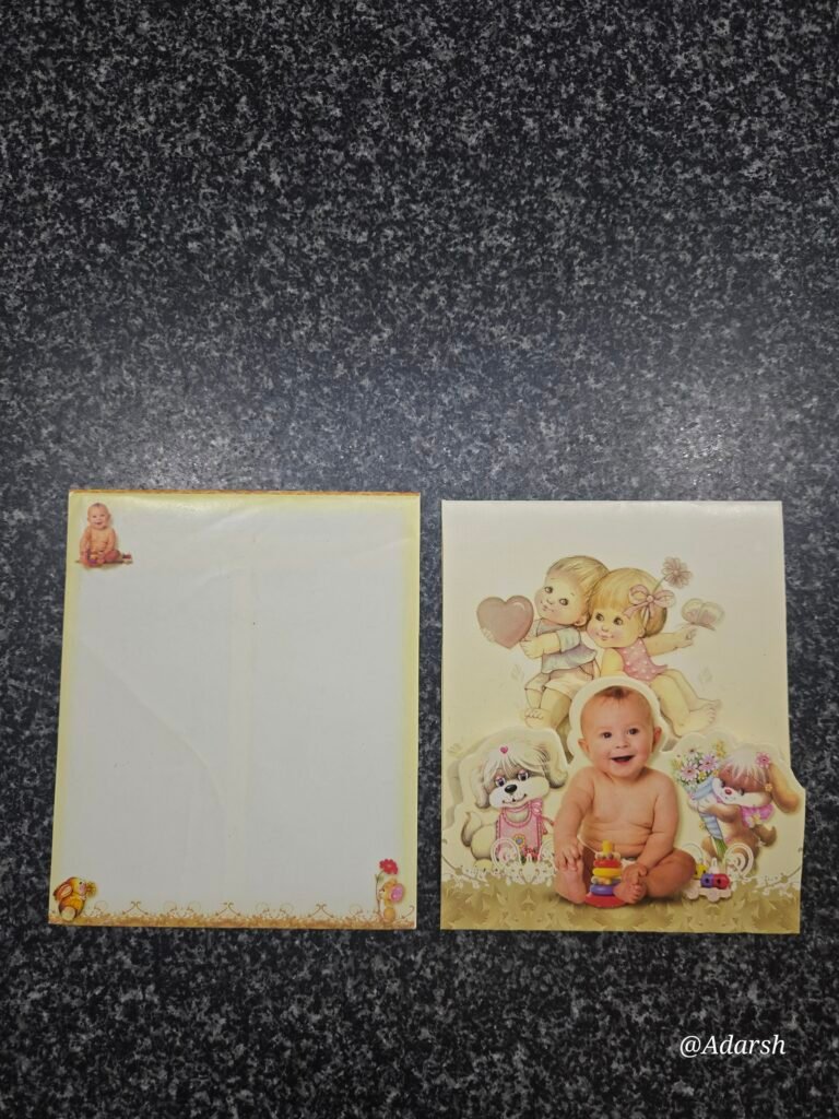 A cream-colored invitation Card