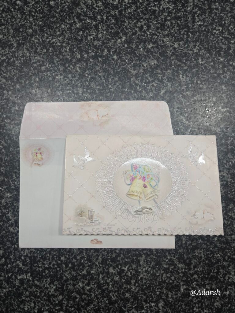 A delicate blush pink and silver wedding Card