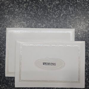 A minimalist and sophisticated stark white wedding Card