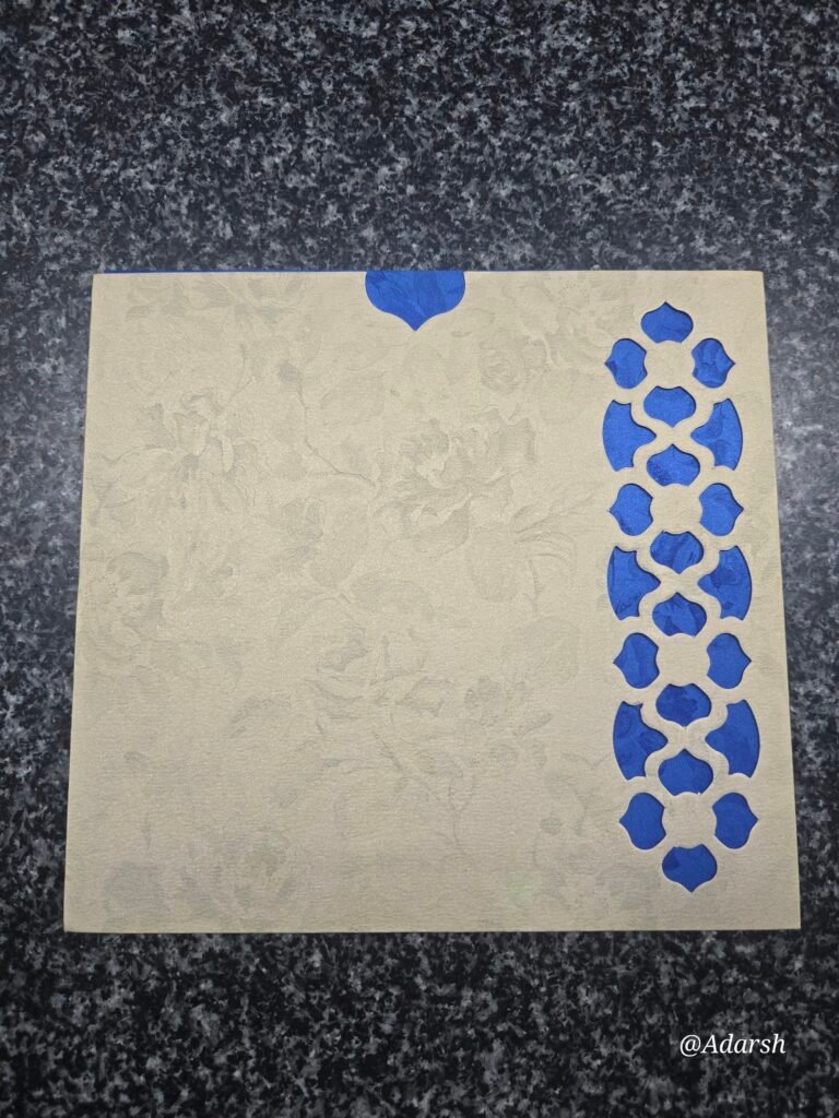 Elegant Cream Shimmer Wedding Invitation Card with Royal Blue Laser-Cut Lattice