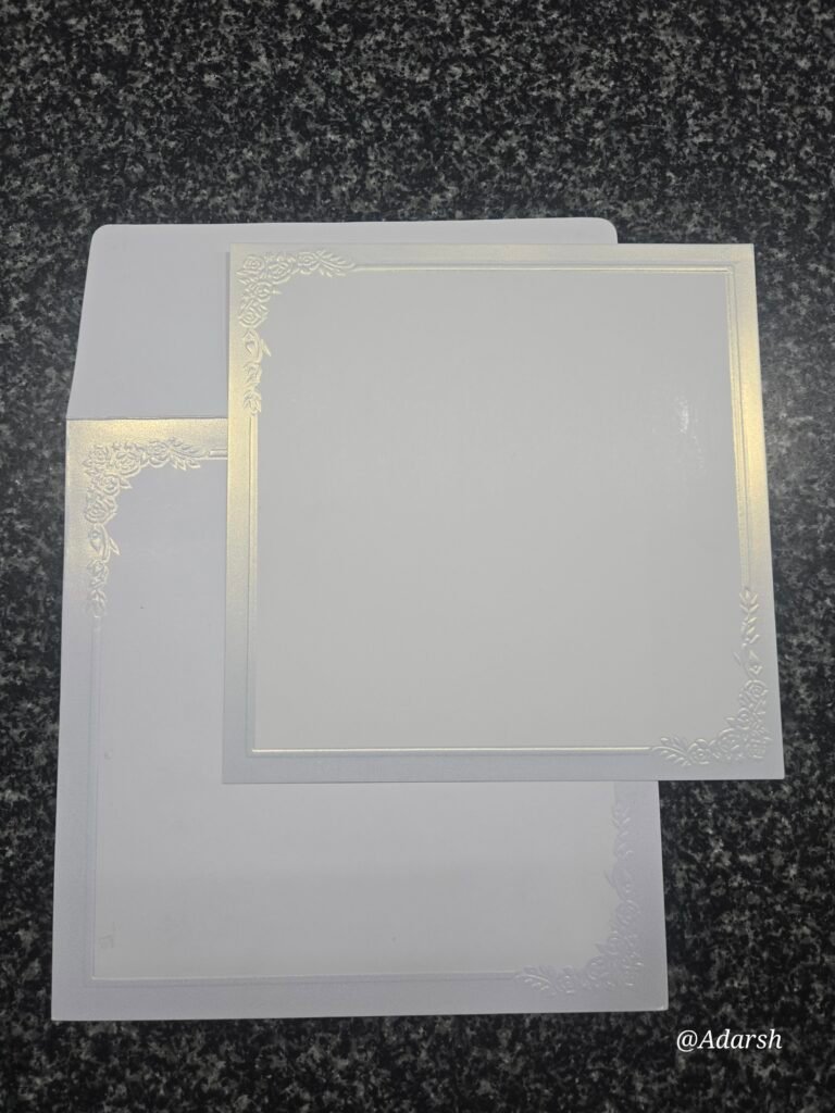 Elegant White Shimmer Square Wedding Invitation Card with Embossed Floral Borders