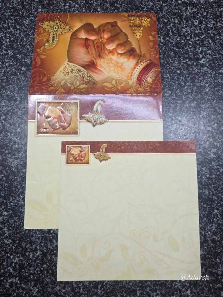 Traditional Hindu Wedding Invitation Card with Hastamilap Motif