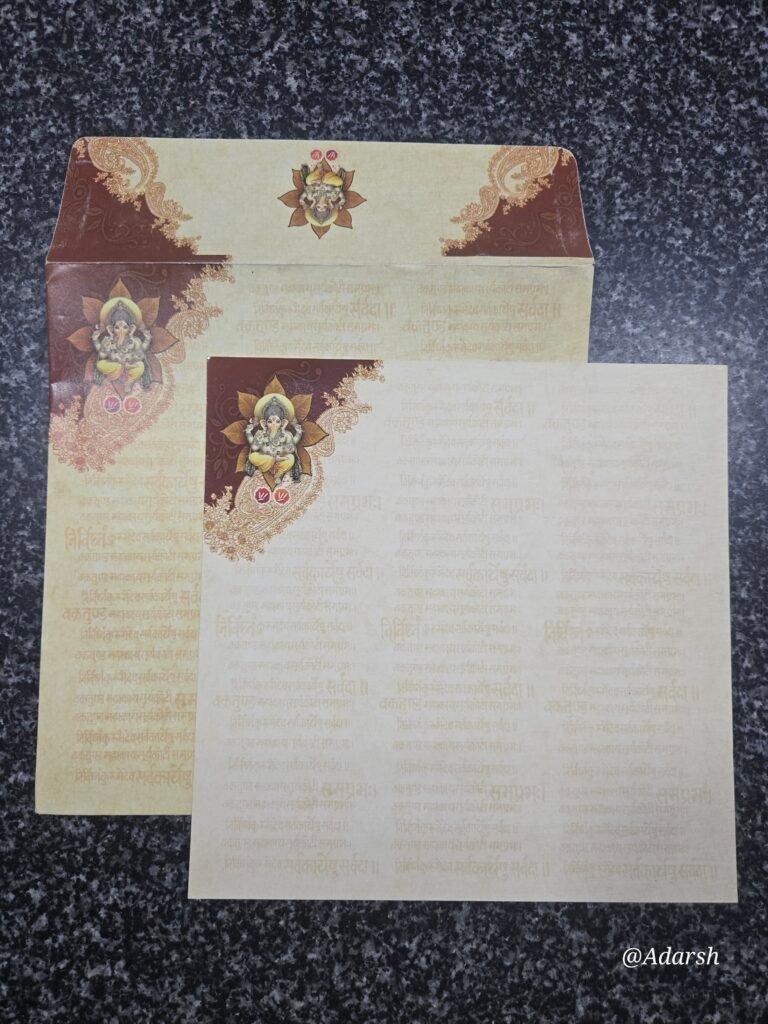 Traditional Maroon and Gold Hindu Wedding Invitation Card with Shloka Watermark