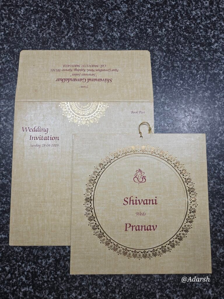 Traditional Cream Hindu Wedding Invitation Card with Gold Mandap Motif