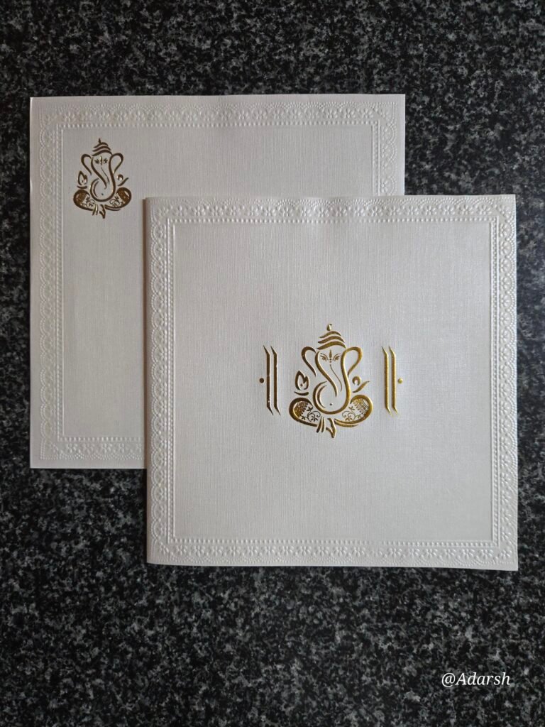 Minimalist Off-White Shimmer Ganesha Wedding Invitation Card