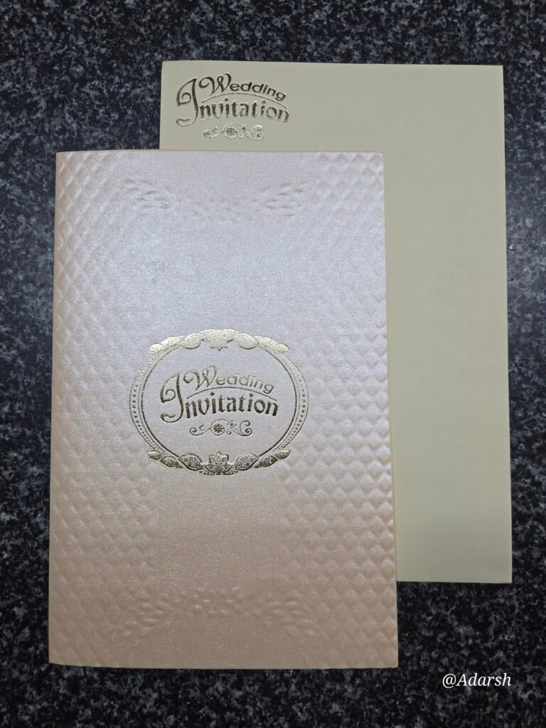 Typography on a shimmering rose-gold to copper-cream base Card