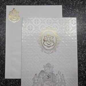 A royal Baraat theme on a heavily textured, shimmering white base Card