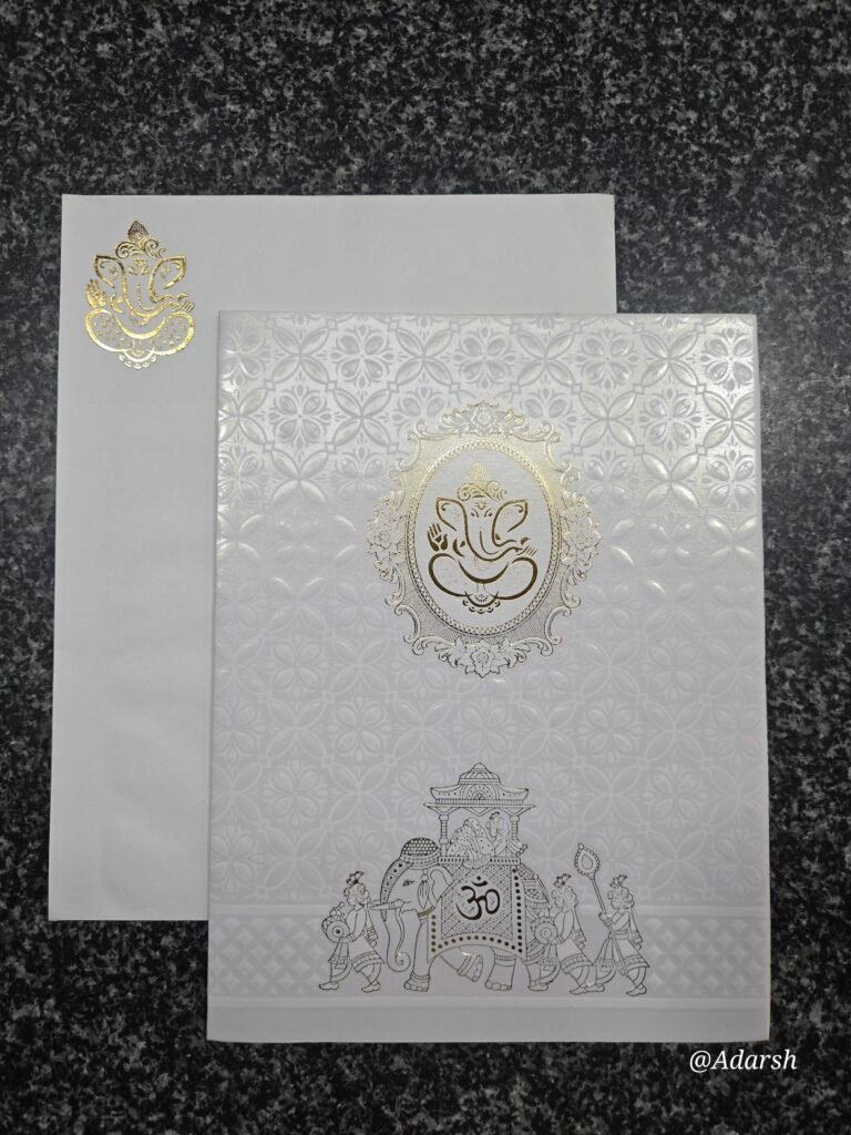 A royal Baraat theme on a heavily textured, shimmering white base Card
