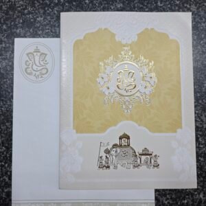 An elegant cream-gold palette and a royal Baraat theme Card