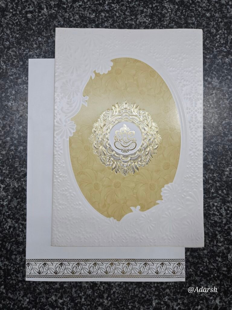 Gold filigree on warm cream-gold and white embossed base Invitation Card