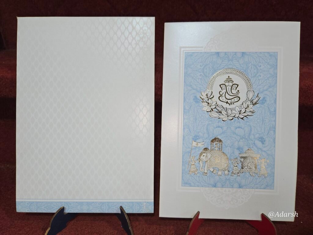Light Blue and White Floral Baraat Hindu Wedding Invitation Card.