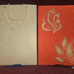 Traditional Orange and Gold Peacock Bag-Style Wedding Invitation Card.