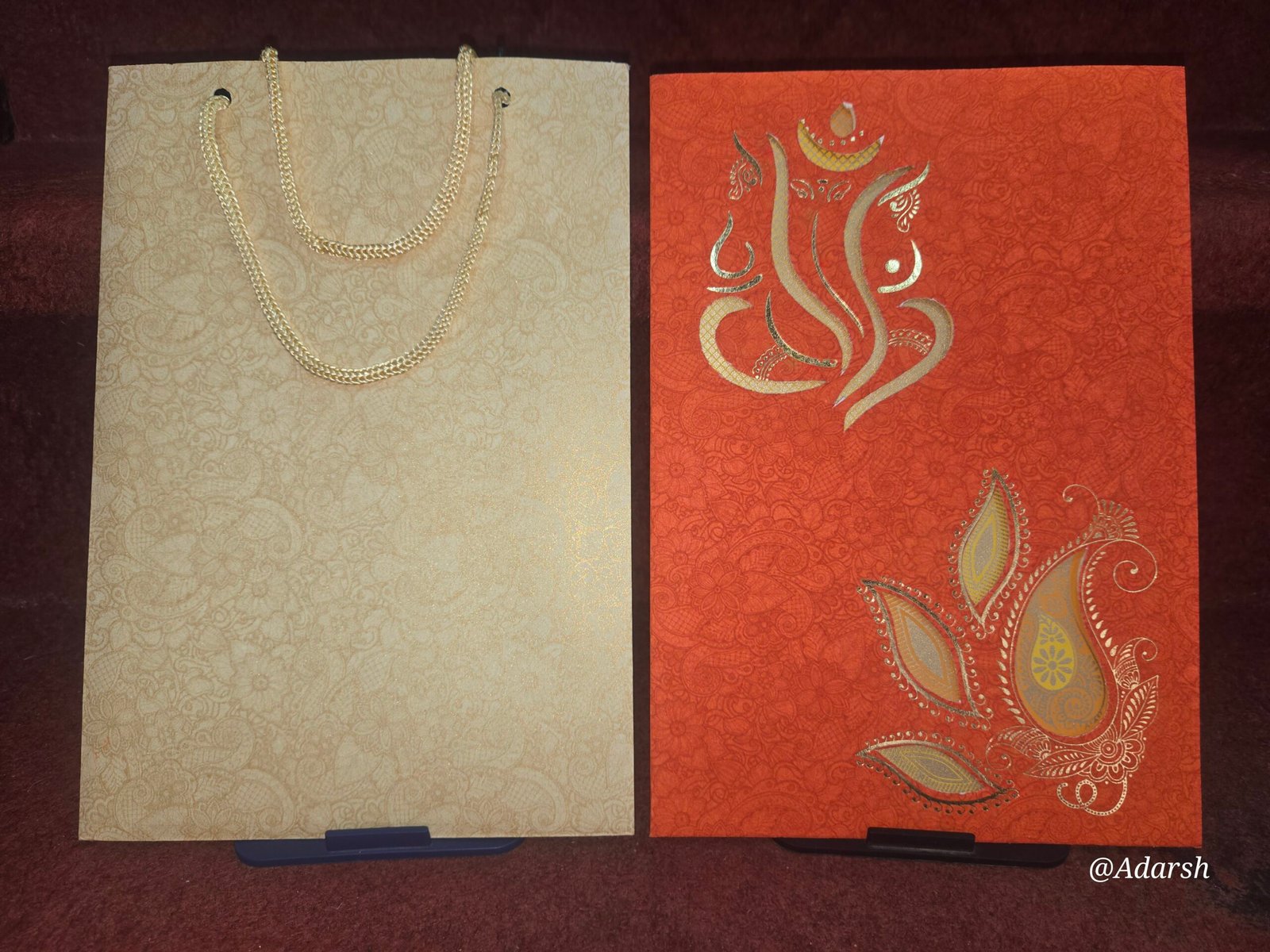 Traditional Orange and Gold Peacock Bag-Style Wedding Invitation Card.
