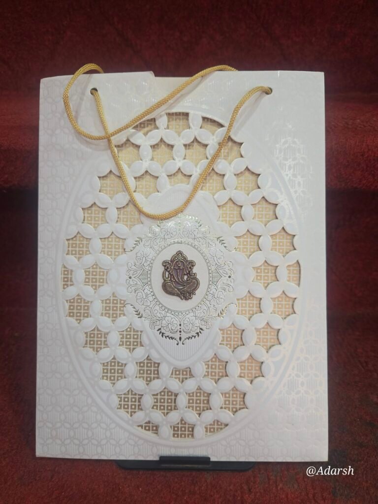Intricate Laser-Cut Ganesha Bag-Style Wedding Invitation Card