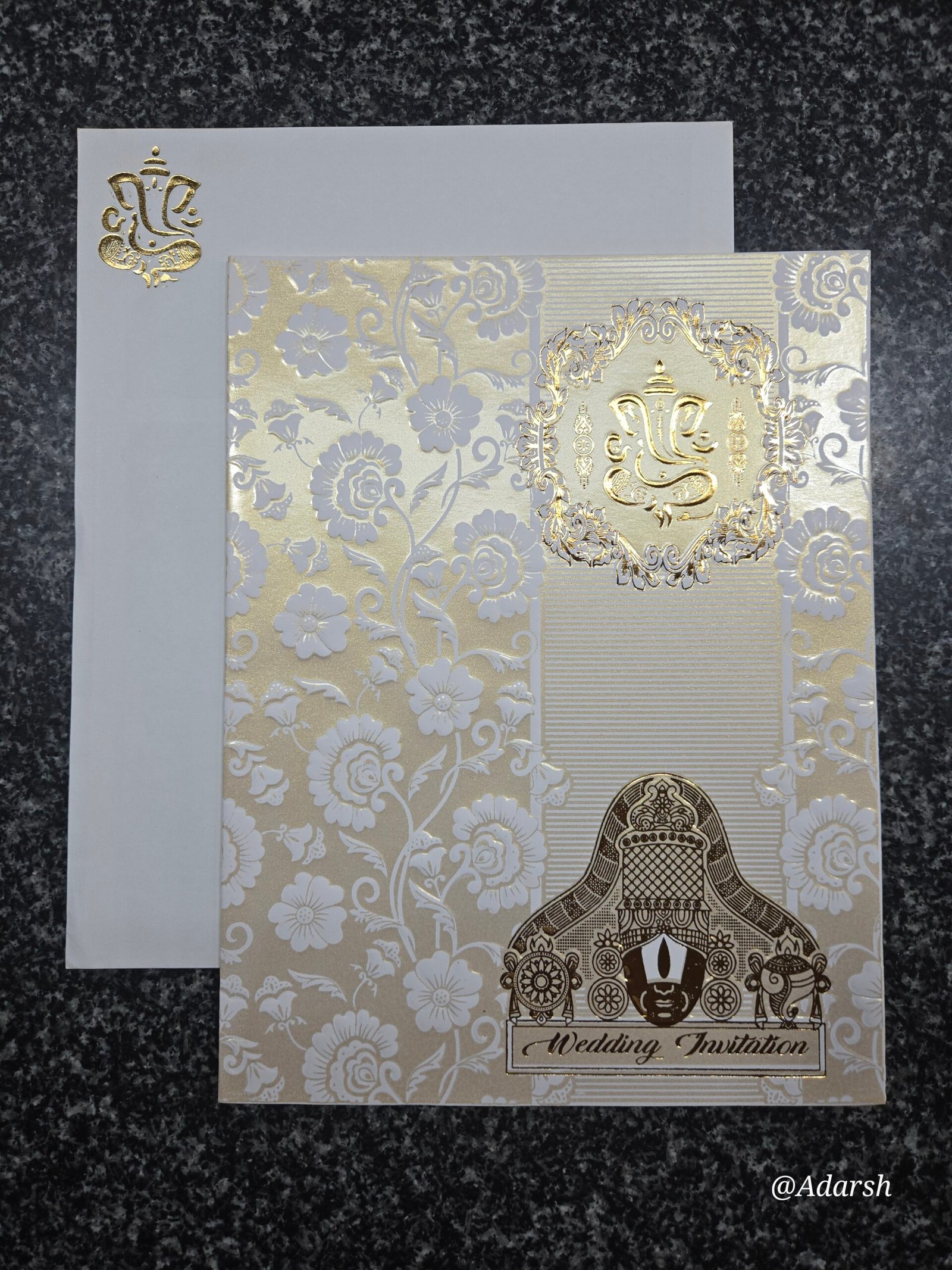 White Shimmer Embossed Floral Ganesha Balaji Wedding Card