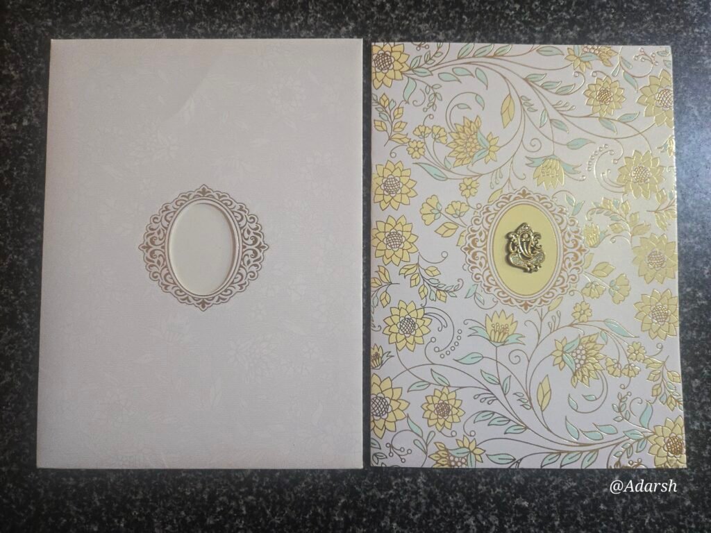 Ivory & Golden Yellow Floral Vine Ganesha Wedding Card