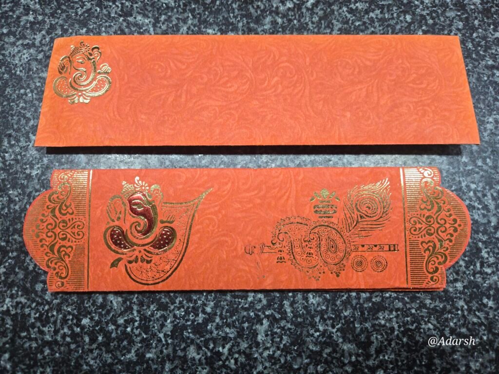 Orange Ganesha Flute Wedding Card