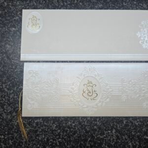 Blind-Embossed Cream Shimmer Ganesha Wedding Invitation Card