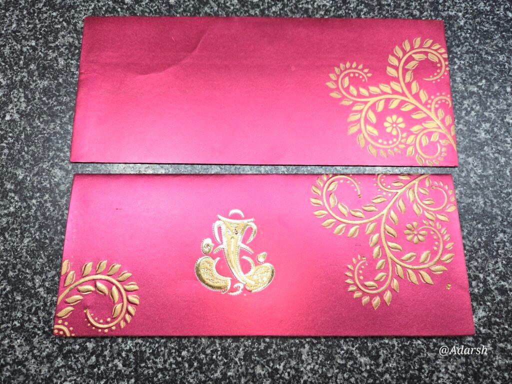 Magenta Shimmer Floral Ganesha Wedding Invitation Card