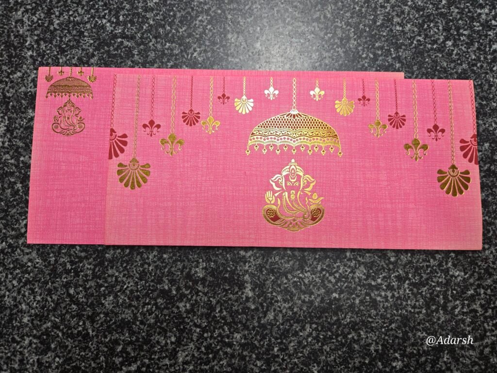 Pink Silk-Textured Umbrella Ganesha Wedding Invitation Card