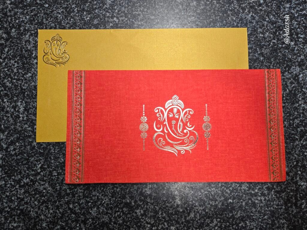 Red and Gold Silk-Textured Ganesha Wedding Invitation Card