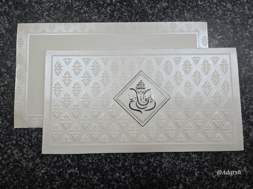 Embossed Ganesha Shimmer Wedding Invitation Card