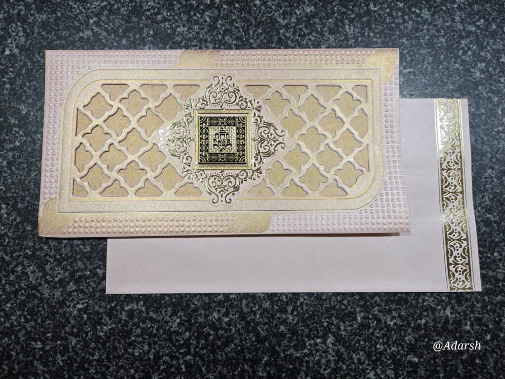 Jharokha style laser-cut wedding card