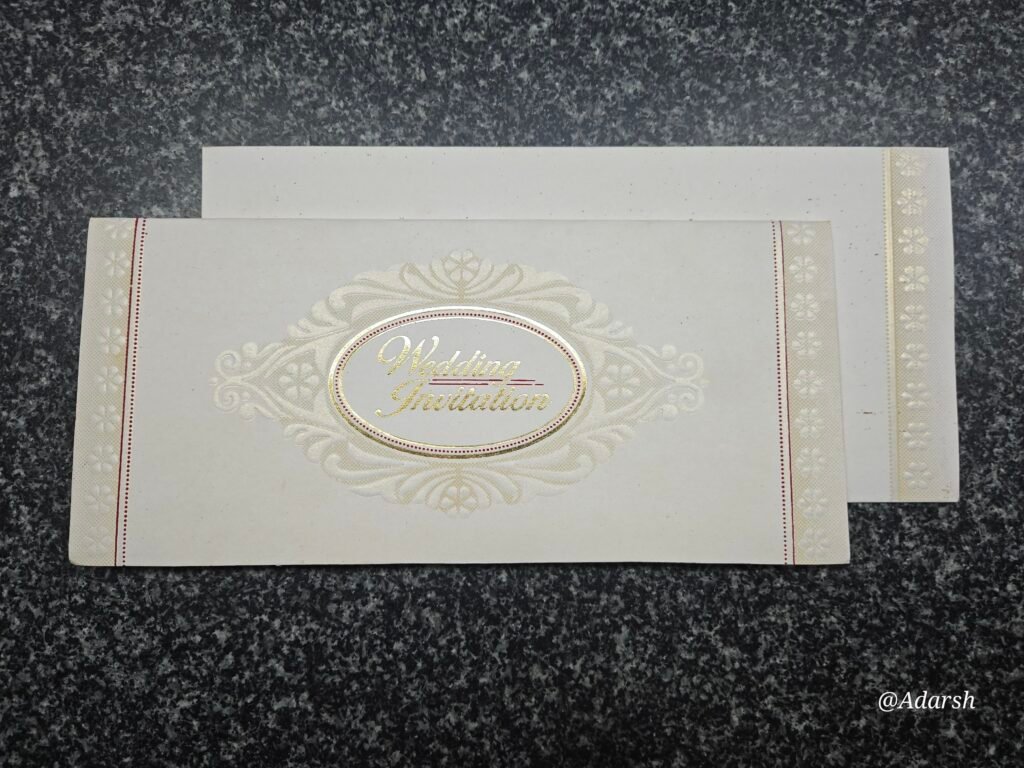 Oval Medallion Embossed Off-White Wedding Invitation Card