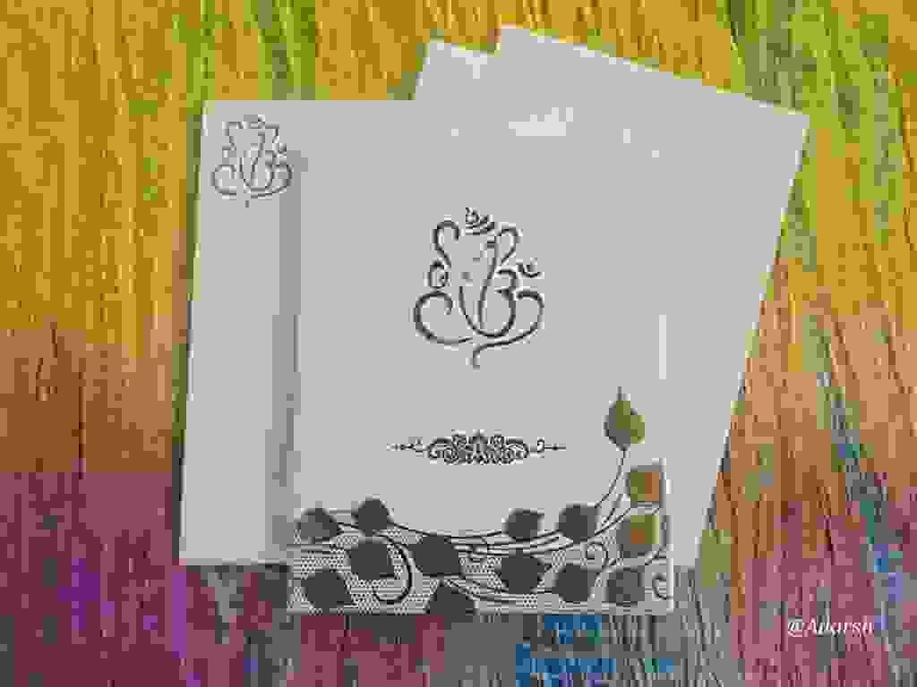Premium Embossed Ganesha and Peepal Leaf Wedding Invitation Card